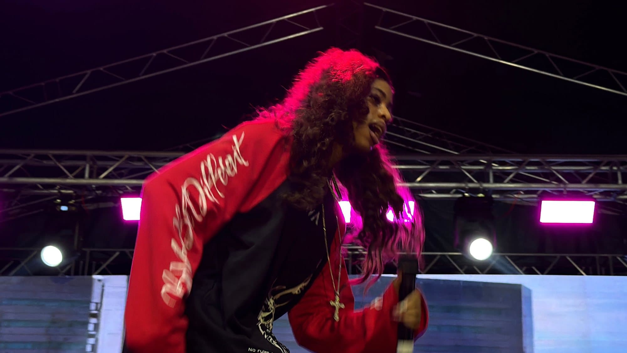 Qing Madi on stage, styled in YOWA, Sound City Tour Enugu 2026